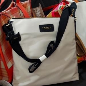 Radley London Elia Mews Zip-Top Crossbody in Light/Pastel Grey.